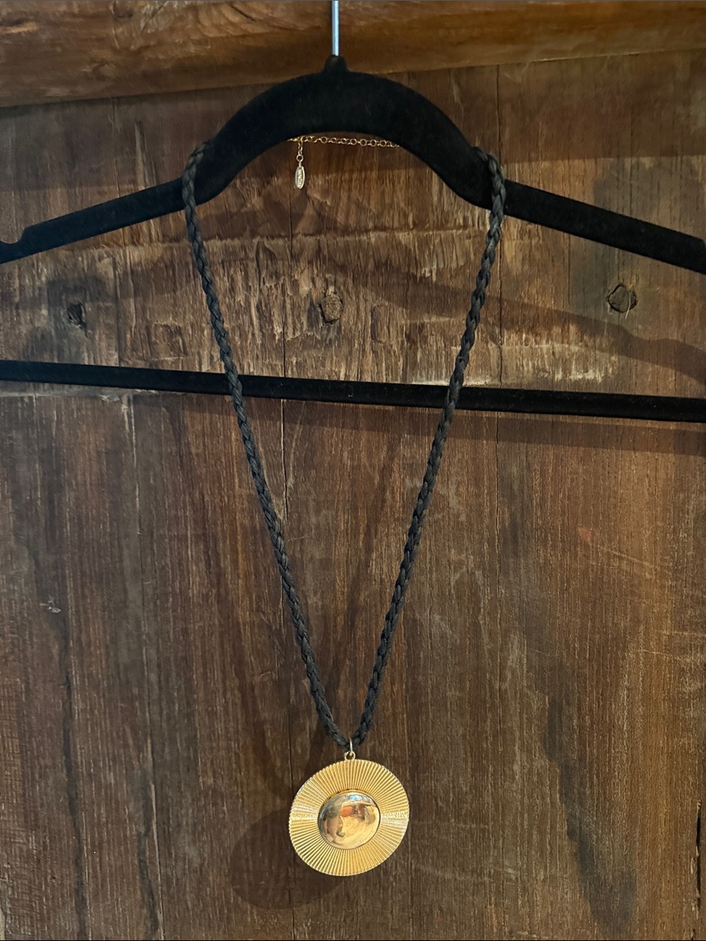 By Anthropologie Gold Sunburst Pendant Necklace on Black Braided Cord